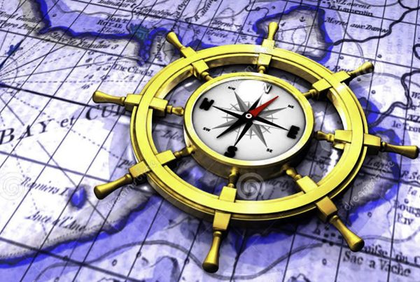 Ships compass and a map